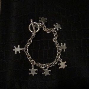 Puzzle piece silver bracelet